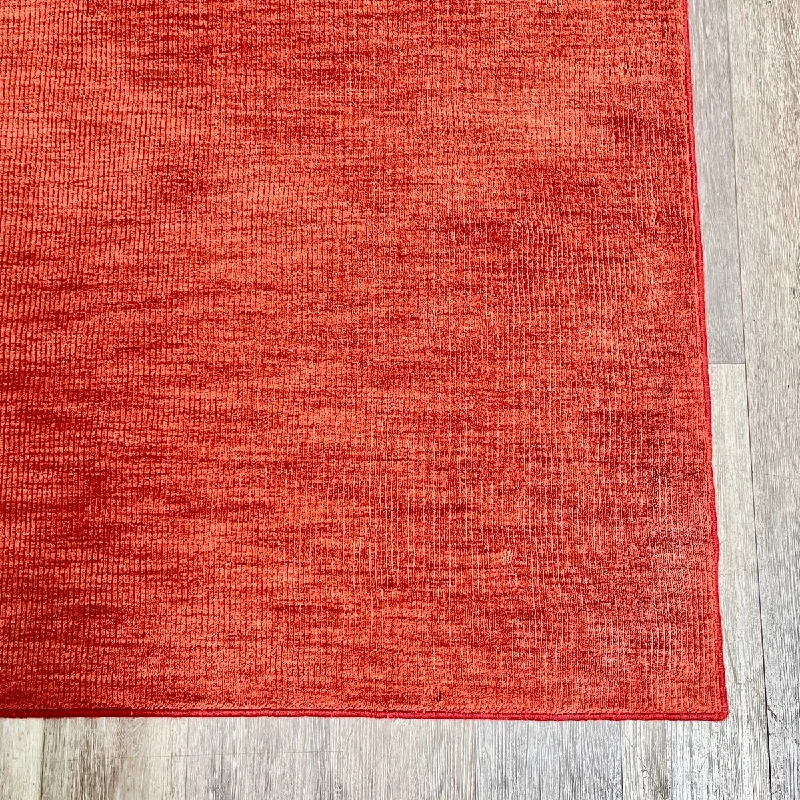 Stark Orange Area Rug